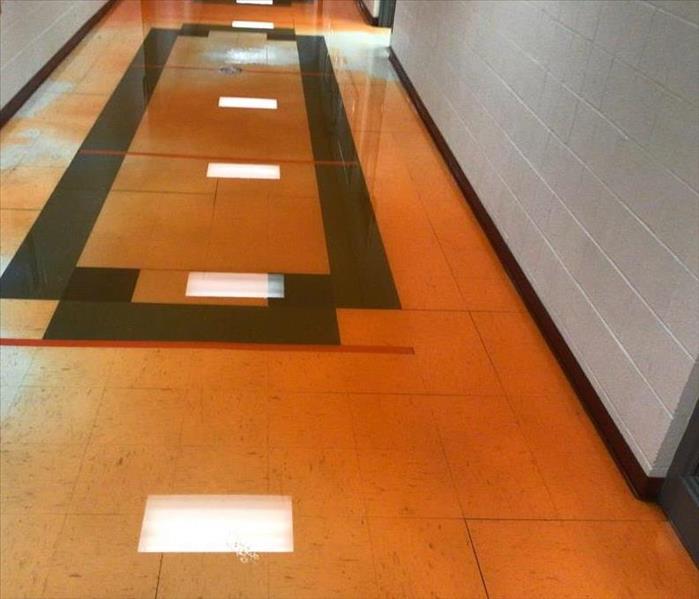 leak on a floor of a school building 